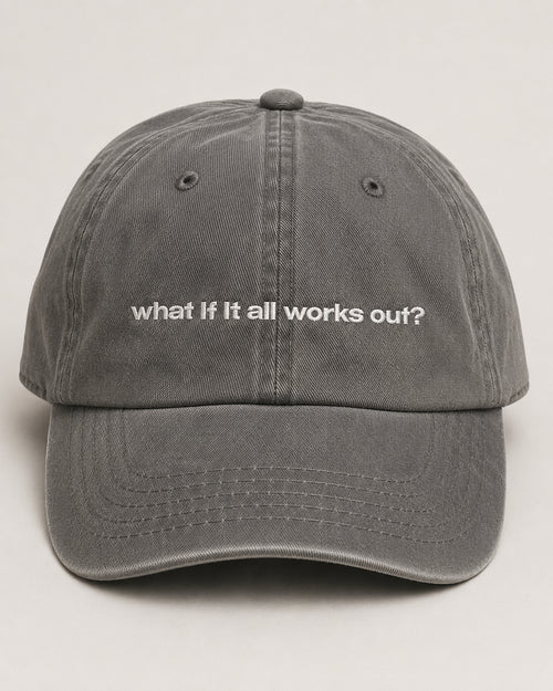 Gray cap with 'what if it all works out?' text on a light gray background