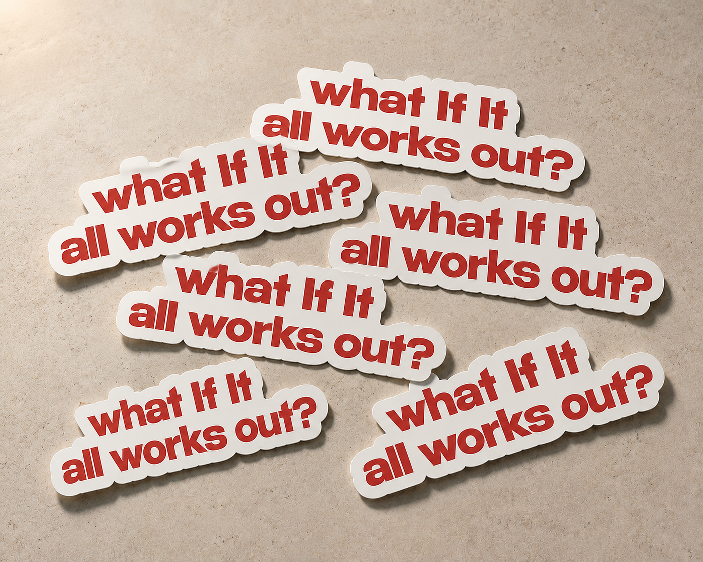 Multiple stickers with 'what If It all works out?' text on a beige background